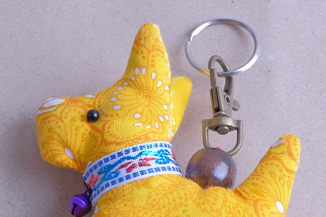 fixation d'un porte-clé chien